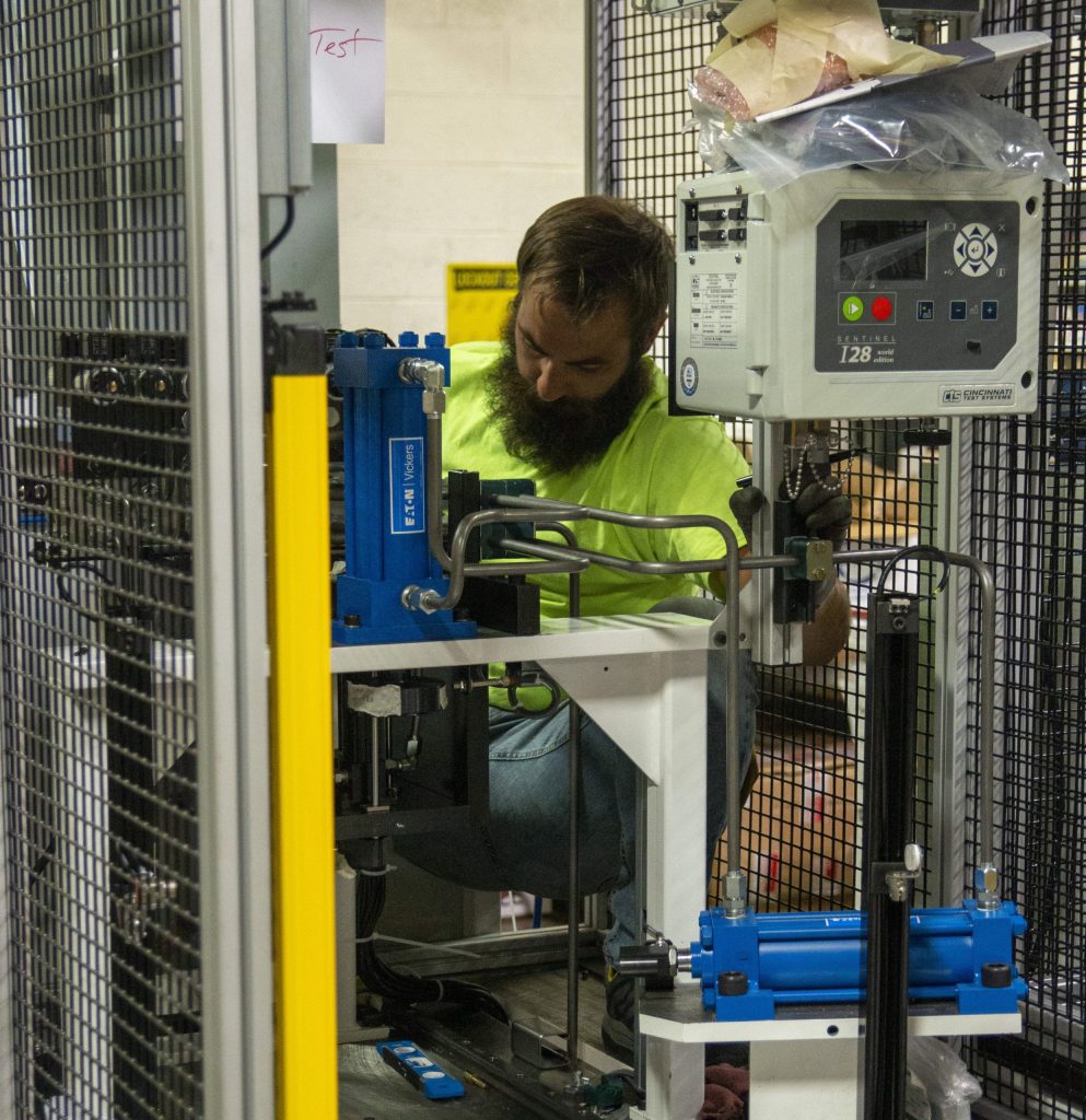 RōBEX technician servicing an assembly automated system